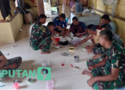 Momen Kebersamaan Satgas TMMD 118 Kodim 0318 Natuna Melepas Lelah bersama Warga