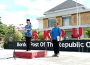 Peringatan Hari Sumpah Pemuda Ke-95 Tahun Satgas Yonif 122/TS Melaksanakan Upacara Di PLBN Skouw