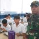 Babinsa Koramil Siantar Selatan Dampingi Program MBG, Perkuat Upaya Cegah Stunting dan Tingkatan Gizi Anak