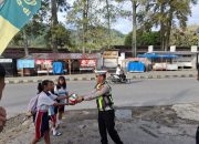 Kasatlantas Polres Toba Sapa Pelajar dan Ajak Pelajar Jadi Pelapor Keselamatan Berlalulintas