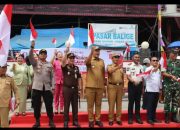 Kapolres Bersama Forkopimda Toba Bagikan Bendera Merah Putih, Wujudkan Semangat Persatuan dan Nasionalisme di Masyarakat